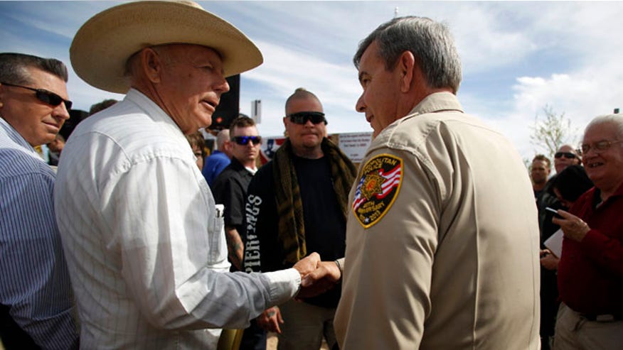 bundy and gillespie shaking hands.jpg